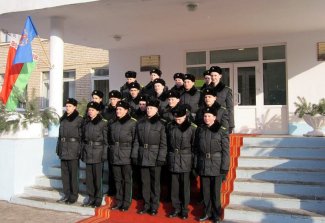 Cadets in winter uniforms on the steps of the school 