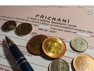 The picture shows Czech koruna and PIT form