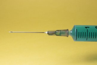 The picture shows the needle from the vaccine